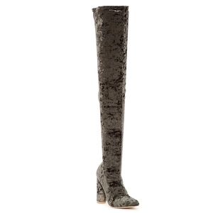 Thigh-high stretch, crushed velvet boots.